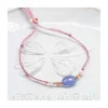 BIANCA - BRACELET TANZANITE OVALE ET PERLES D'EAU DOUCE SUR TRESSE LUREX