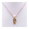 BIANCA - COLLIER CHARM MAIN AVEC COEUR