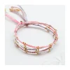 JANE - BRACELET PERLES DORÉES SUR CORDON LUREX
